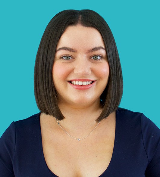 a headshot of Eleni a woman with a dark bob