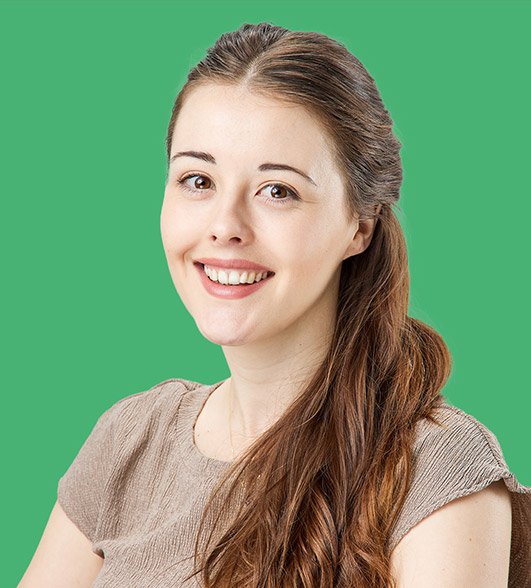 a headshot of Rach a woman with long brown hair